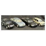 (D) 4 Diecast And Plastic Cars As Pictured