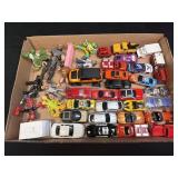 (D) Several Assorted Cars and Figurines As