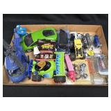(D) Several Assorted Cars and Figurines As