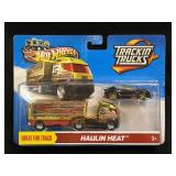 (D) Hot Wheels Trackin Trucks Haulin Heat 2012