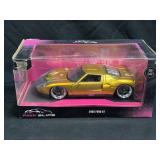 (D) 2005 Ford GT Diecast Car: Jada Pink Slip 1/24
