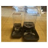 One large water bowl,one small feeder