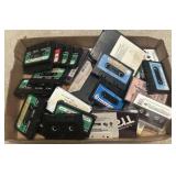 Box of assorted cassette tapes