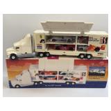 (D) Vintage 1995 Exxon Race Car Carrier