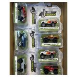 (C) 7 Assorted Just Trucks as Pictured NIB