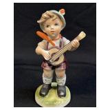 (A) Vintage Norleans Boy Playing Banjo  Porcelain