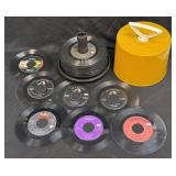 (D) Vintage Gold Disk-Go-Case with Several 45 RPM