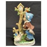 (A) Figurine Vintage Boy with Tree and Bird House