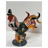 Poultry in Motion Ceramic 10'-Tail has small chip