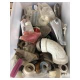 Large plastic container containing plumbing