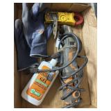 Box containing Ohm meter, rubber gloves, hawk,