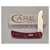 Case XX Dark Red Bone Peach Seed Jig Sod Buster