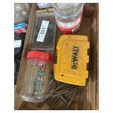 Trailer lot containing screws, number and letter