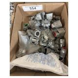 Box containing several conduit fasteners
