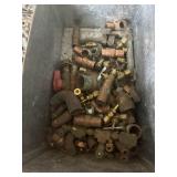 Metal box containing several copper and brass