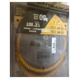 Two 12 inch saw blades, one finish blade and one