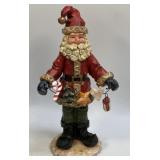 (B) Decorative Santa Figurine Holding Garland