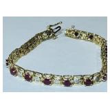 10KT YELLOW GOLD RUBY WITH DIAMOND ACCENT BRACELET