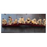 P - EIGHT JAPANESE ICONIC FIGURINES WITH DISPLAY