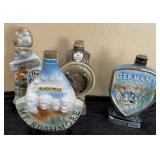 V - LOT OF 4 CERAMIC DECANTERS (B49)