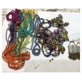 V - MIXED LOT OF COSTUME JEWELRY (J64)