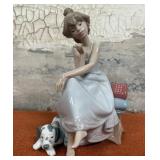 303 - PORCELAIN GIRL SEATED WITH DOG