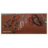 303 - ASSORTED COLORFUL COSTUME NECKLACES