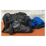 303 - BLACK LEATHER DUFFEL WITH BLUE BAG