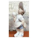 303 - PORCELAIN BOY TENNIS PLAYER FIGURINE