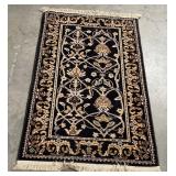 11 - FRINGED RUG 52X30"