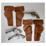777 - LOT OF VINTAGE TOY GUNS & LEATHER HOLSTERS