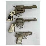 777 - LOT OF 3 VINTAGE HUBLEY METAL CAP GUNS
