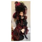 W - BURGUNDY CABARET PORCELAIN DOLL WITH FEATHERS