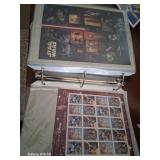 J - LOT OF COLLECTIBLE POSTAGE STAMPS IN BINDER