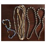 J - FOUR COSTUME JEWELRY BEADED NECKLACES
