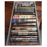 J - MIXED LOT OF DVDS IN BIN