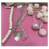 43 - DECORATIVE BEADED AND POM GARLAND SET