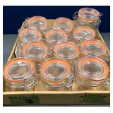 43 - 12 SMALL SEALED JARS (G27)