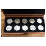 10 SILVER PEACE DOLLARS IN WOOD BOX