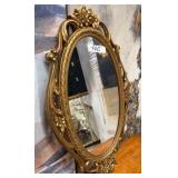 440 - ORNATELY FRAMED OVAL WALL MIRROR 28"L