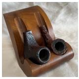 B - VINTAGE PIPE HOLDER & TWO PIPE HEADS SIGNED
