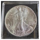 1989 - 1oz FINE SILVER ONE DOLLAR (579 F)