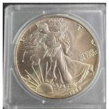 1988 - 1oz FINE SILVER ONE DOLLAR (579 G)