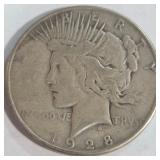 1928 - PEACE SILVER DOLLAR (999 A104)