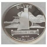 .999 FINE SILV ER ONE TROY OUNCE (995 E)