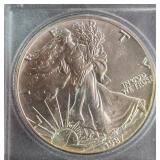 1987 - 1oz FINE SILVER ONE DOLLAR (579 B)