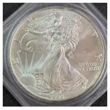 1995 - 1oz FINE SILVER ONE DOLLAR (579 AJ)