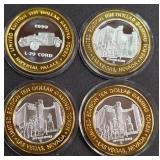 LOT OF 4 - $10  SILVER DOLLAR GAMING TOKEN (551 S)
