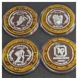 LOT OF 4 - $10  SILVER DOLLAR GAMING TOKEN (551 Z)