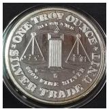 1oz .999 FINE SILVER COIN (877 J)